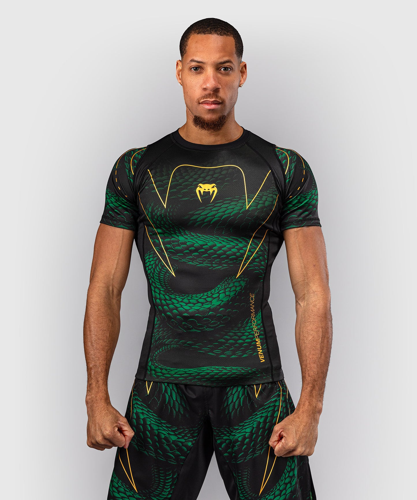 Venum Matupa Rashguard Manga Corta - Negro/Verde/Oro