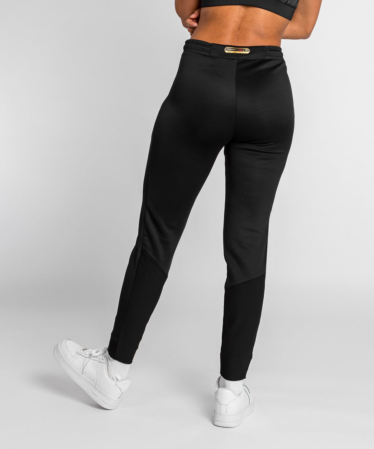 UFC Adrenaline by Venum Authentic Fight Night Walkout-Hose für Frauen Women’s Walkout Pant - Champion