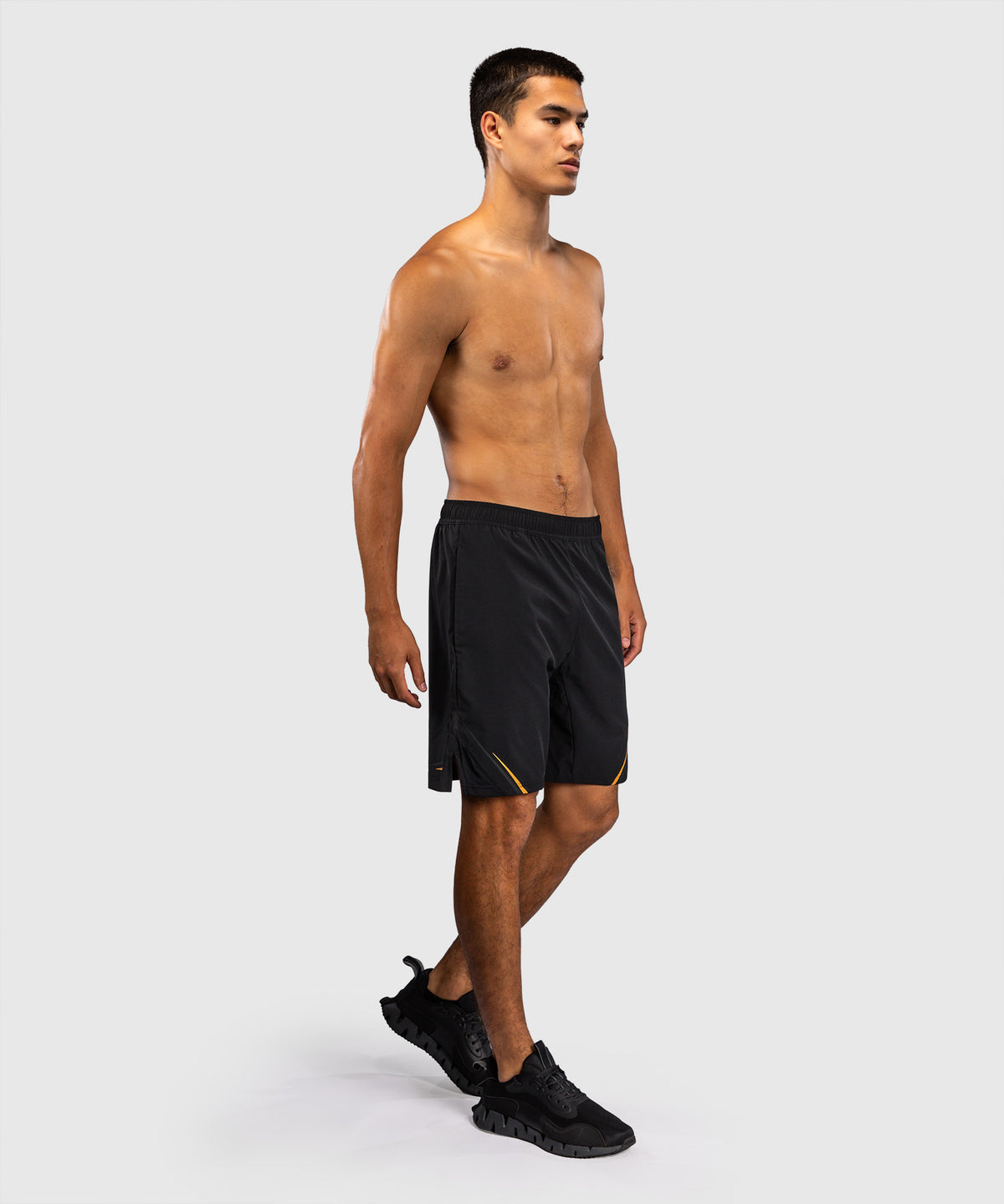Venum G-Core Pantalón Corto de Entrenamiento - Negro/Oro