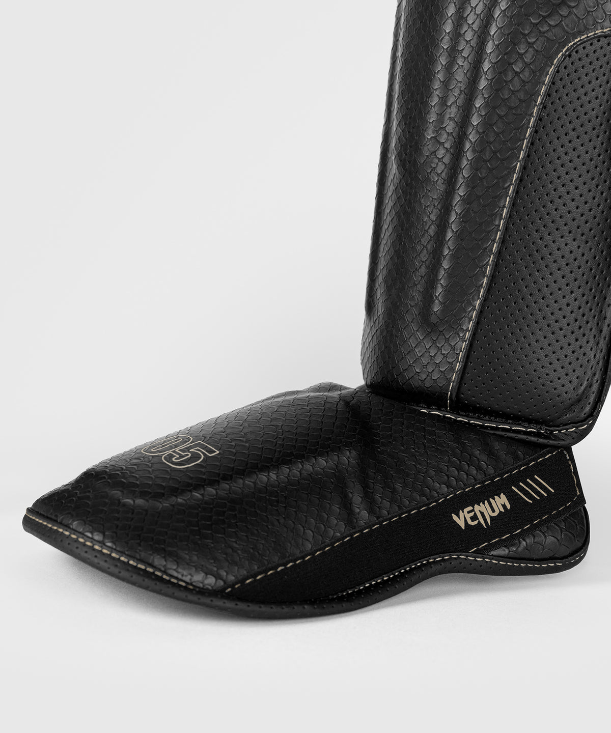 Protège-tibias Venum Impact Evo Scales – Noir
