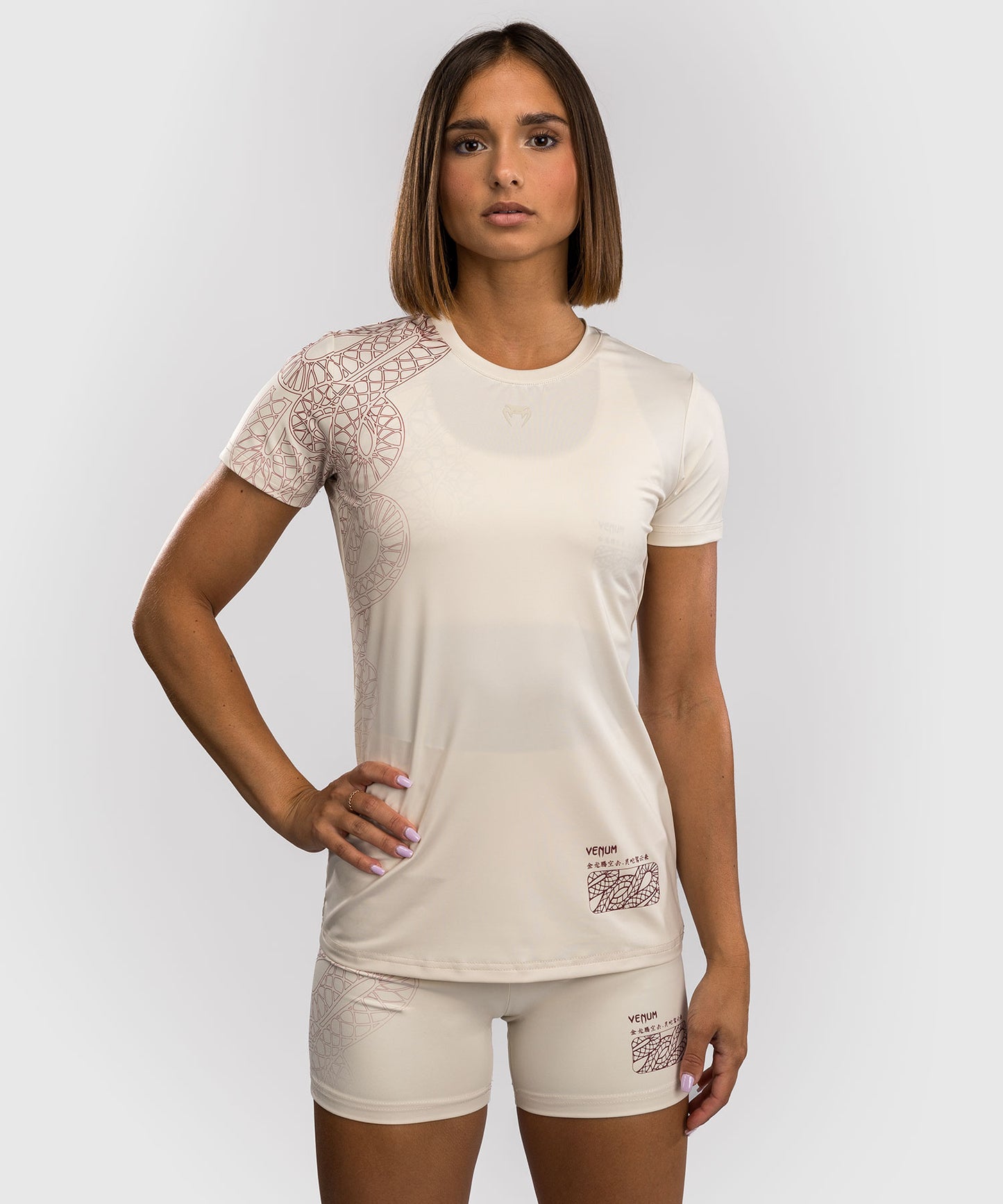 Venum Serpenti Camiseta Dry-Tech para Mujer – Marfil/Burdeos