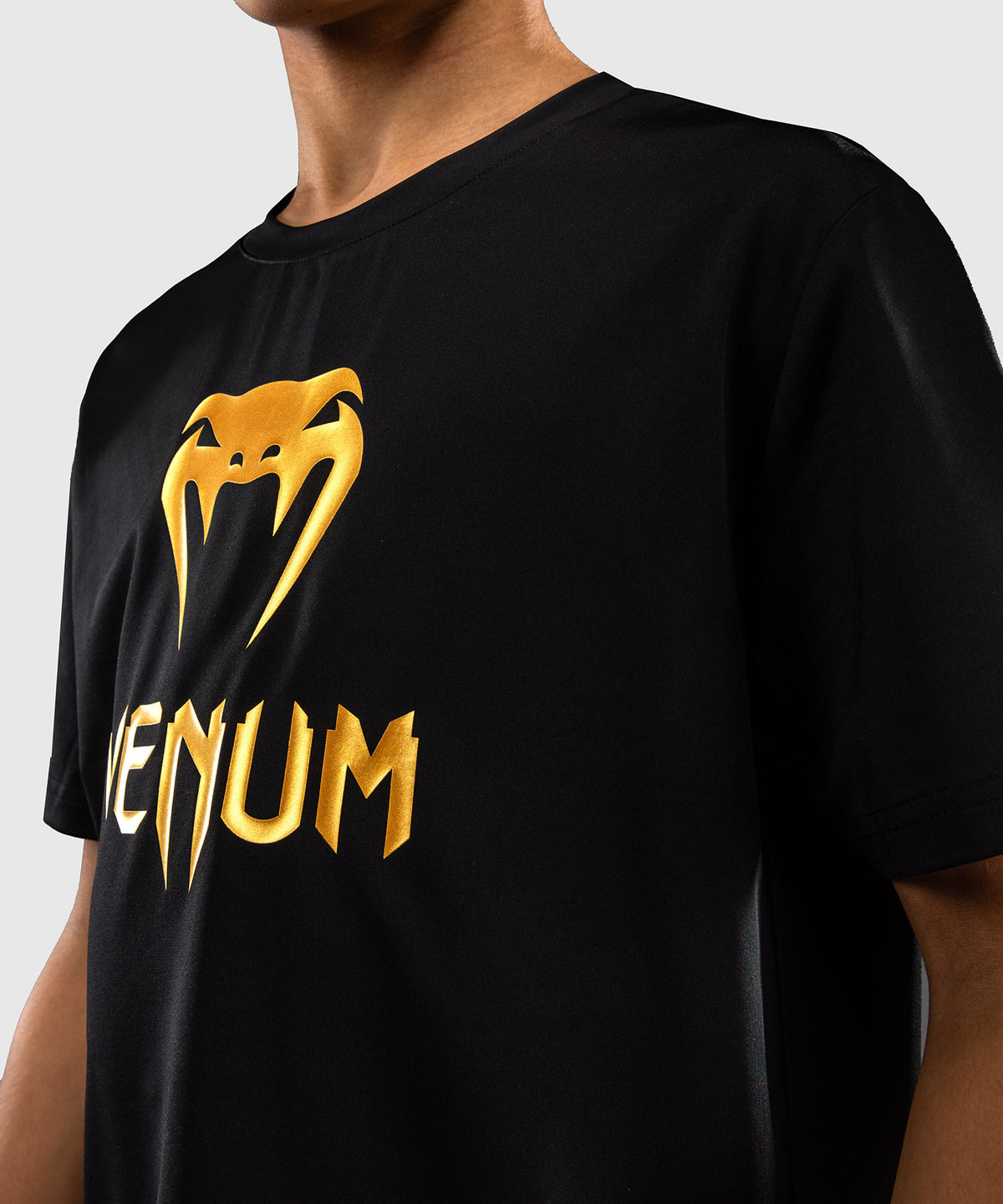 Venum Classic Camiseta Dry Tech para niños - Negro/Dorado