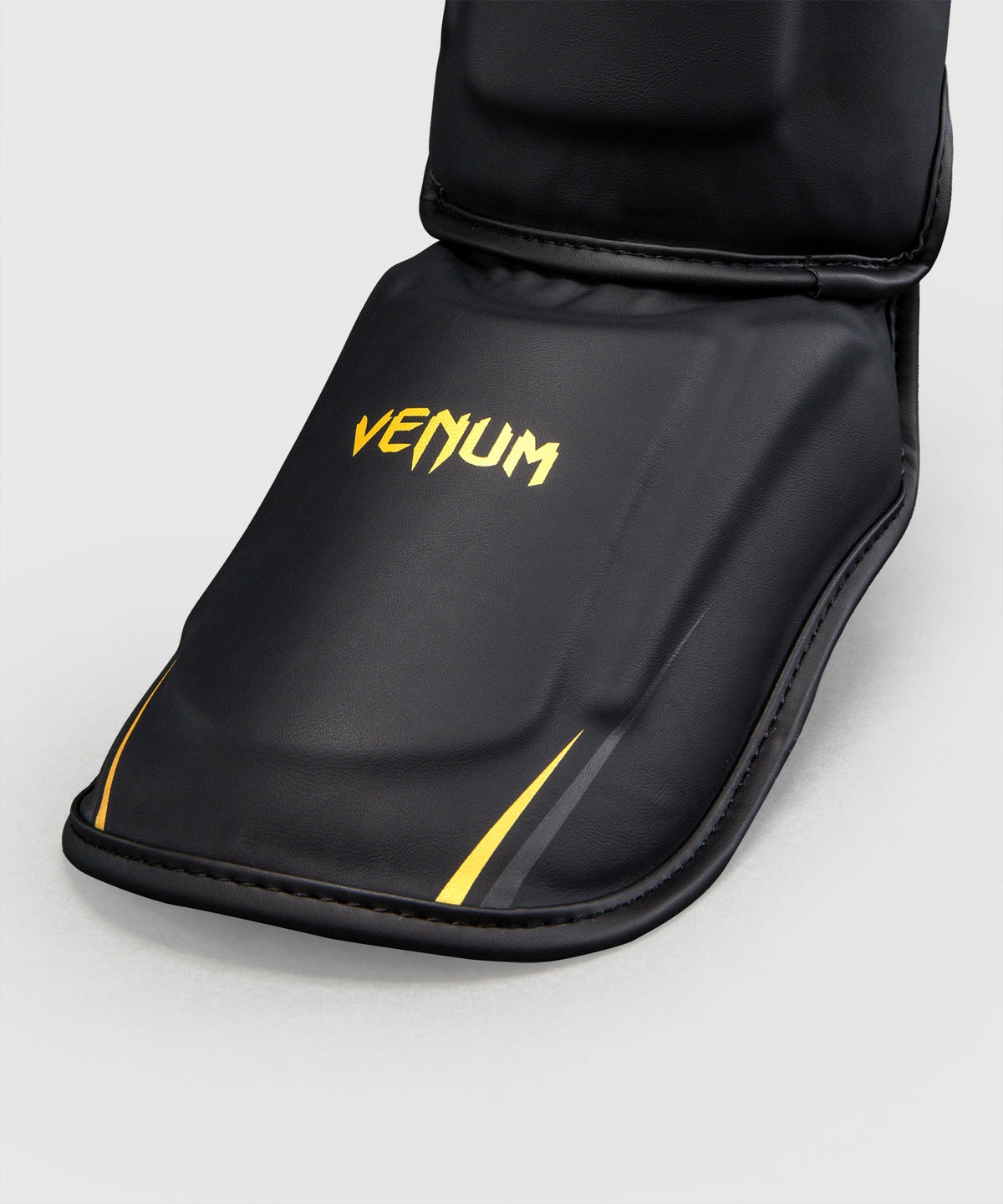 Protège-tibias Venum G-Core - Noir/Or