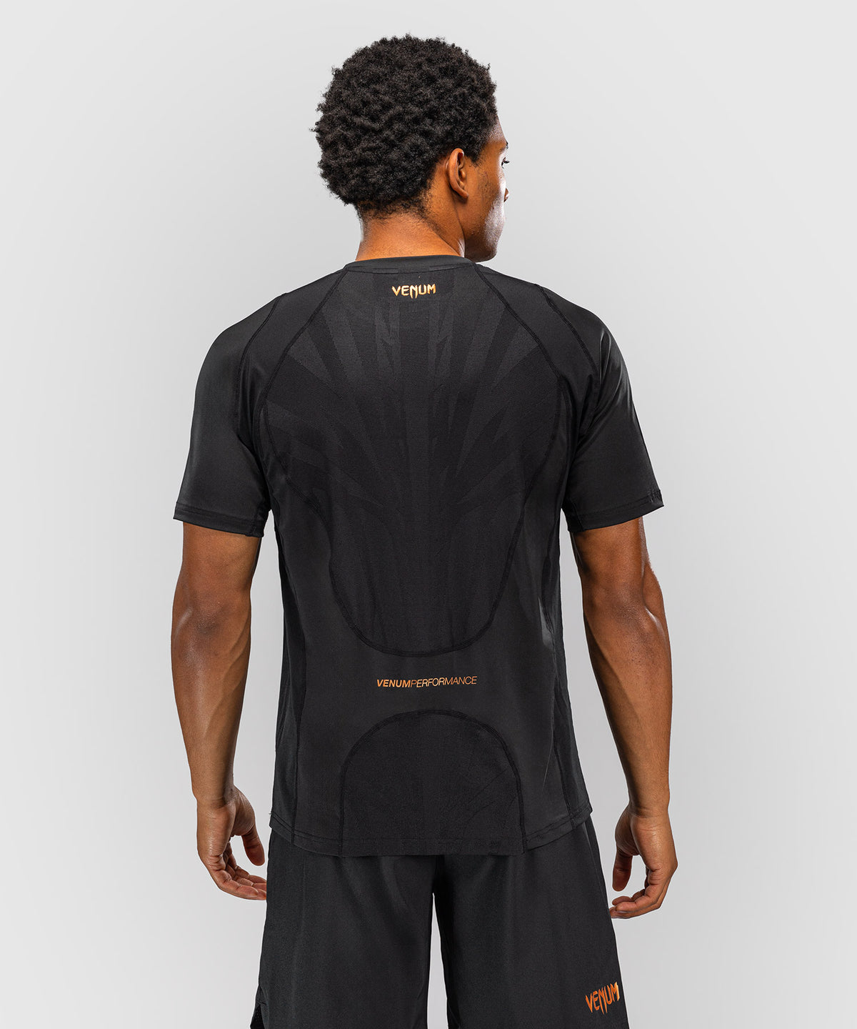 Venum G-Fit Revolution Camiseta Dry Tech - Negro/Cobre