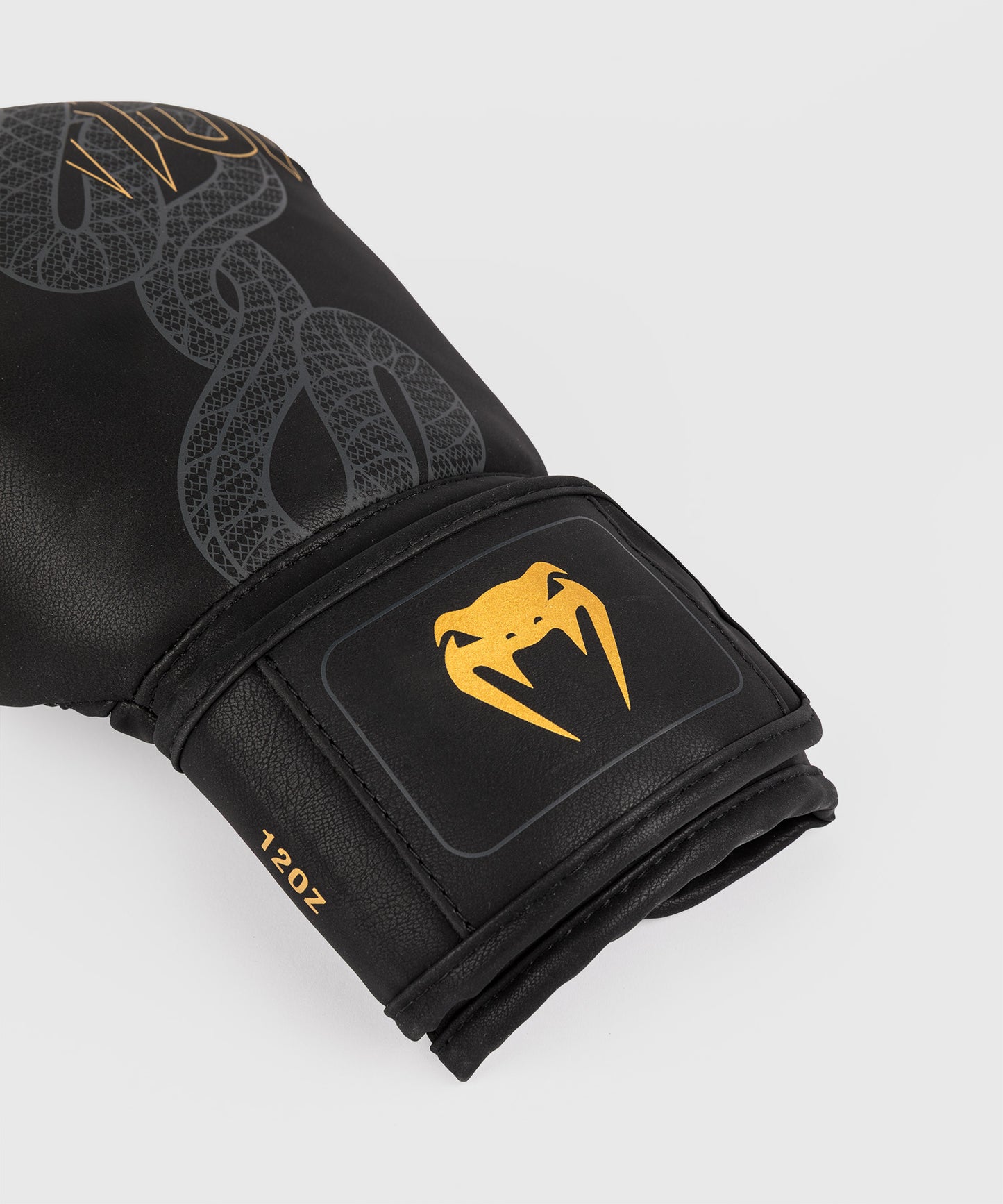 Venum Serpenti Boxhandschuhe – Schwarz/Silber/Gold