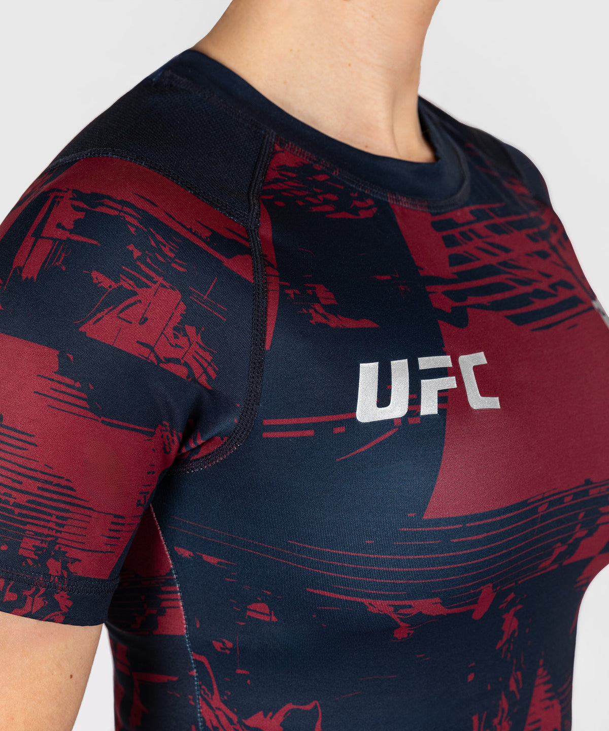 UFC Zenith by Venum Authentic Fight Week Rashguard maniche corte Performance Donna - Blu navy/Bordeaux/Argento