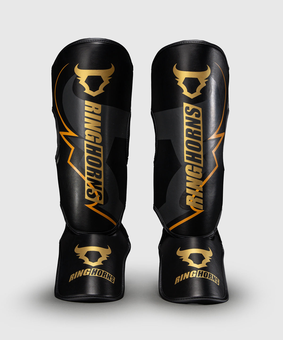 Ringhorns Charger by Venum Shin Guards - Black/Gold