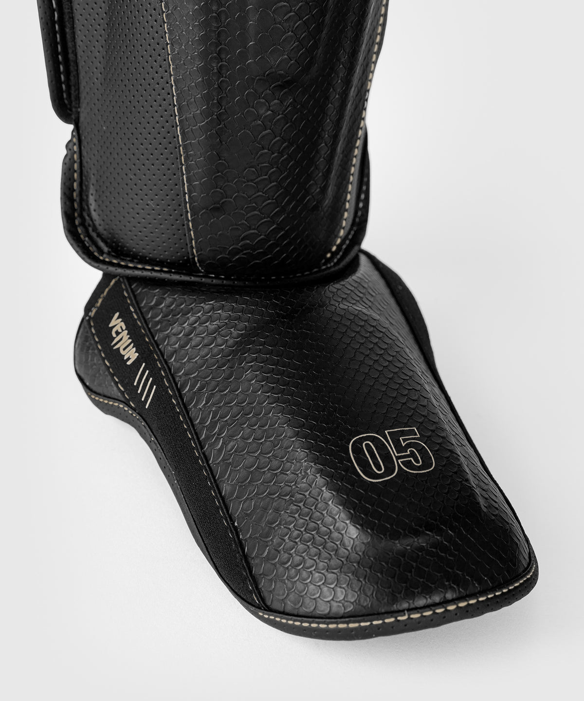 Protège-tibias Venum Impact Evo Scales – Noir