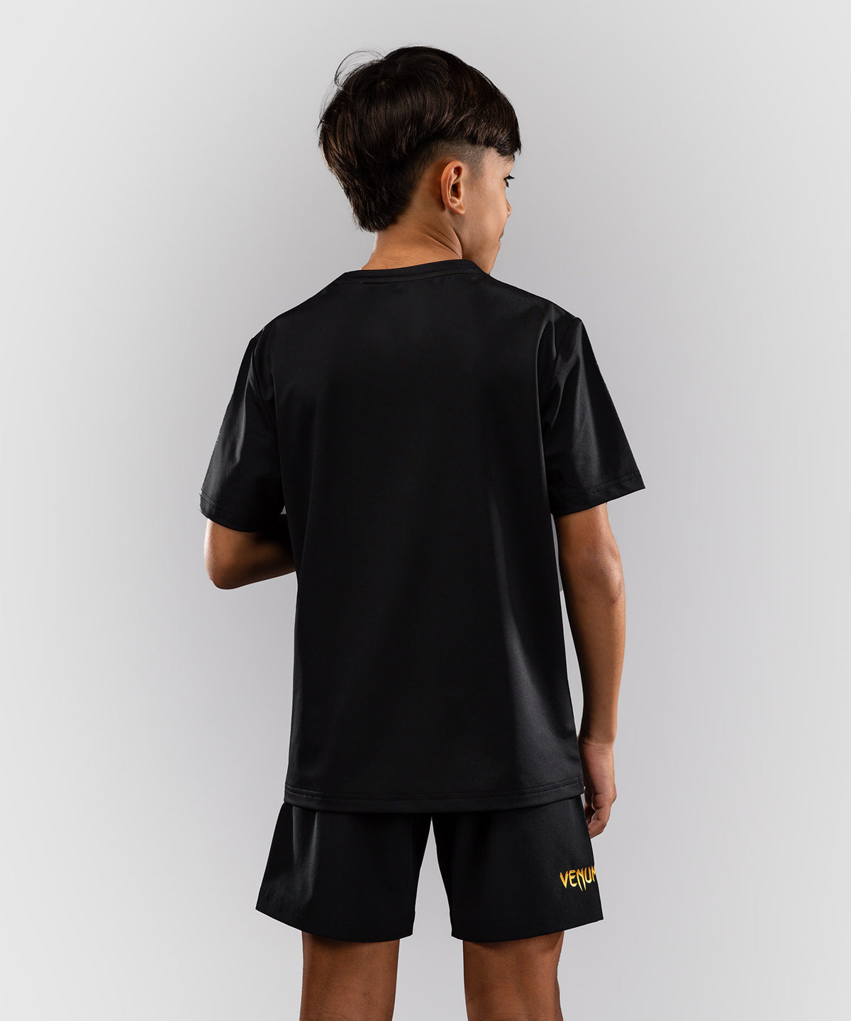 Venum Classic Camiseta Dry Tech para niños - Negro/Dorado