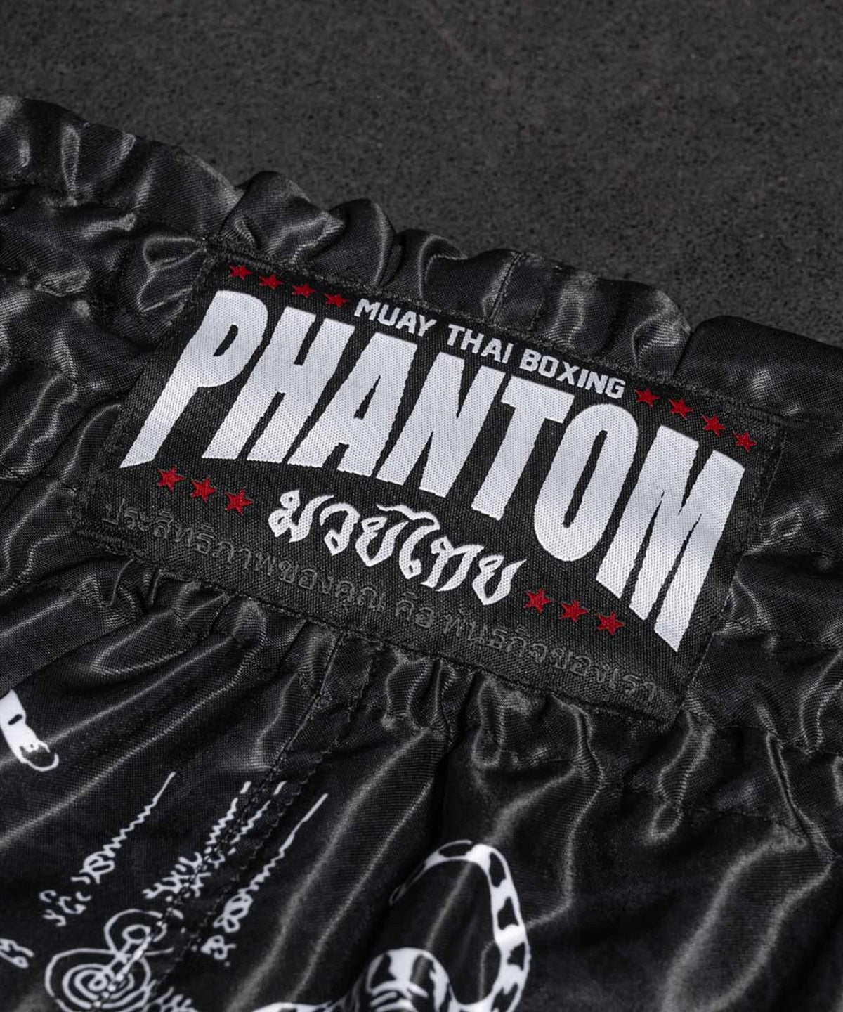 Phantom Athletics Sak Yant Pantalones de Muay Thai - Negro