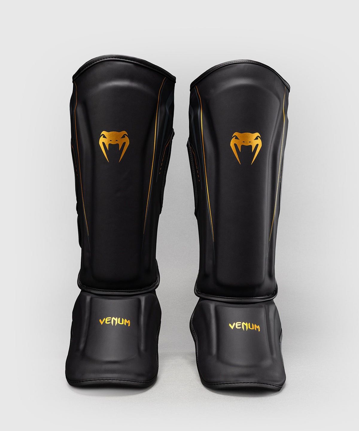 Venum Streamline Paratibie – Nero/Oro