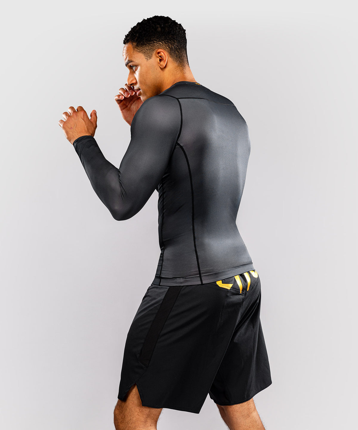 Venum Attack Rashguard de manga larga - Negro/Dorado