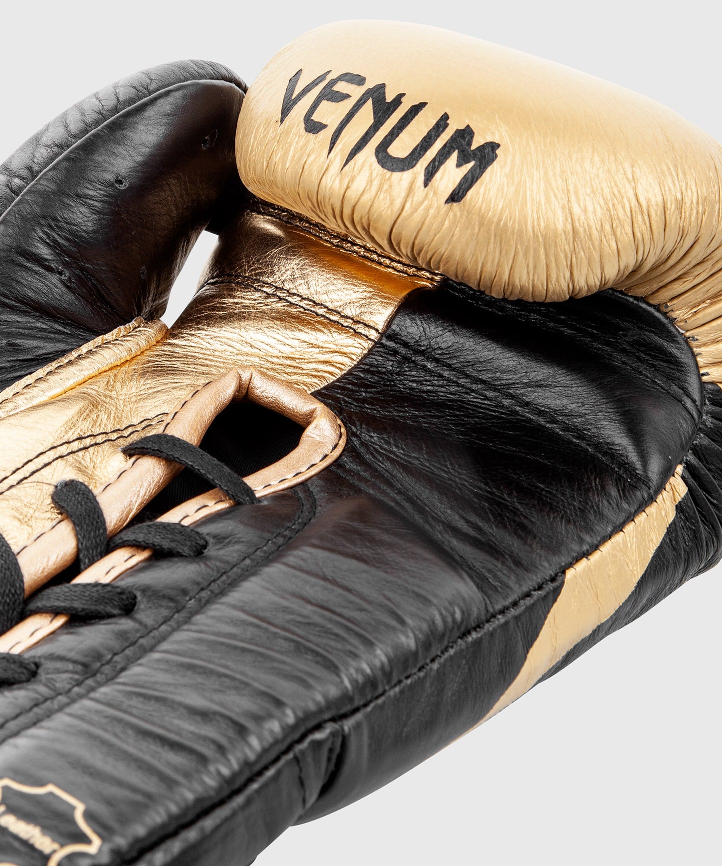 Guantoni da boxe professionali Venum Hammer con lacci - Nero/Oro
