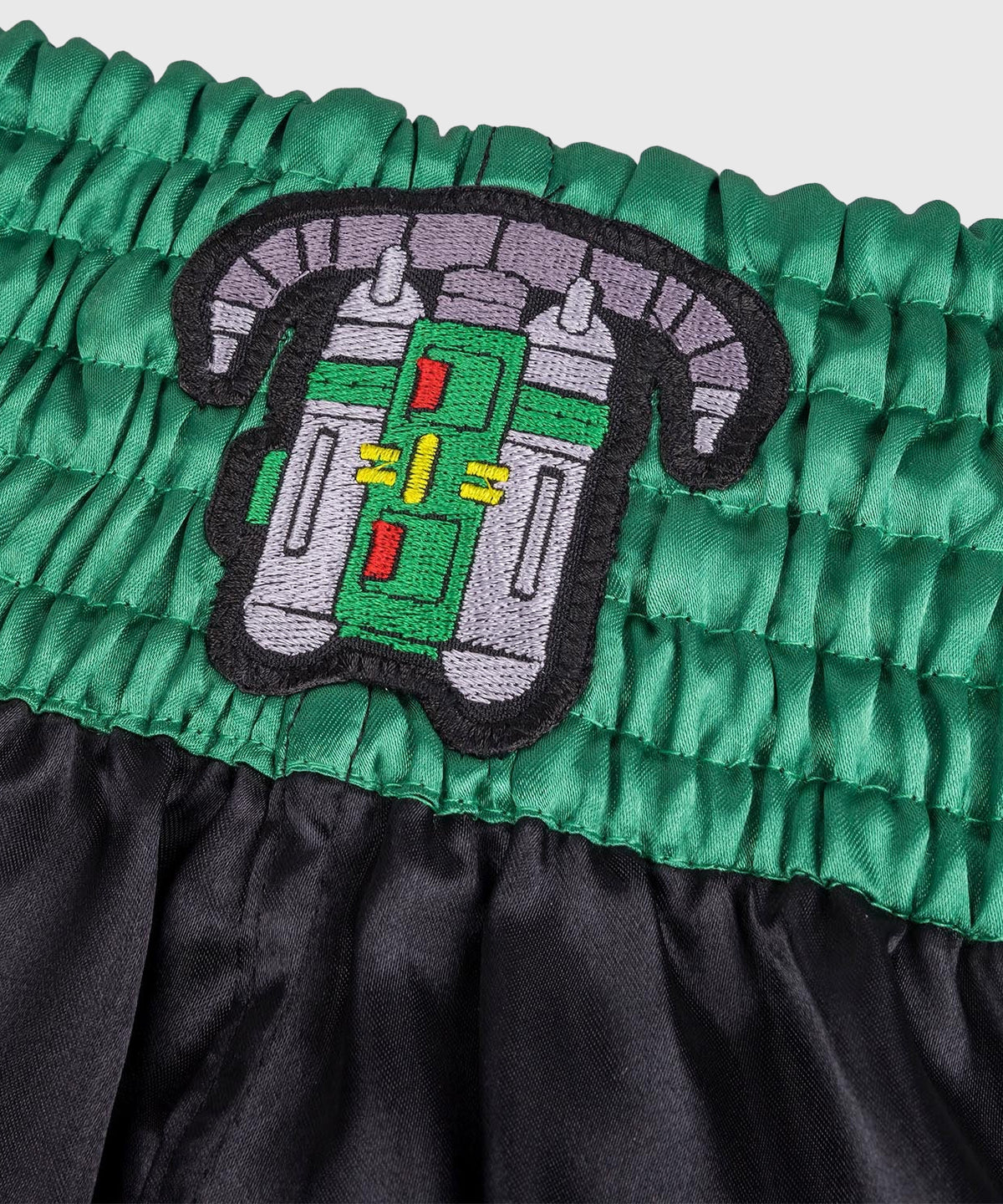 8 Weapons West Coast Muay Thai Shorts - Black/Green