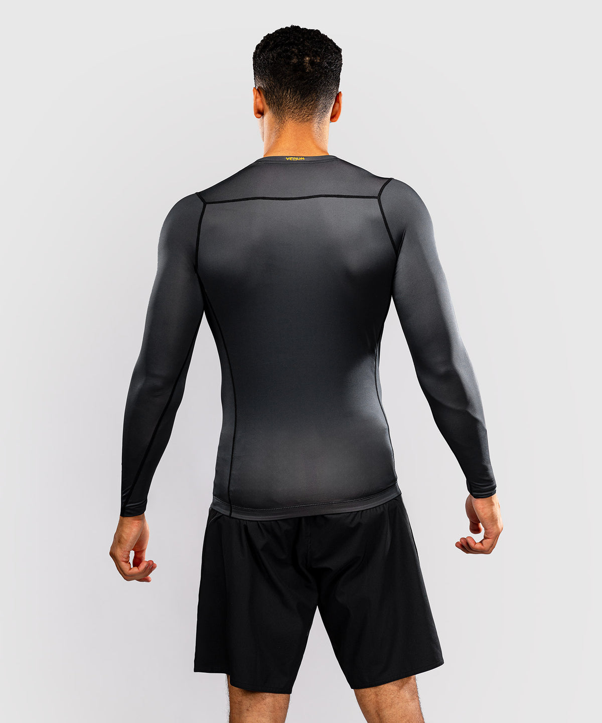 Venum Attack Rashguard de manga larga - Negro/Dorado