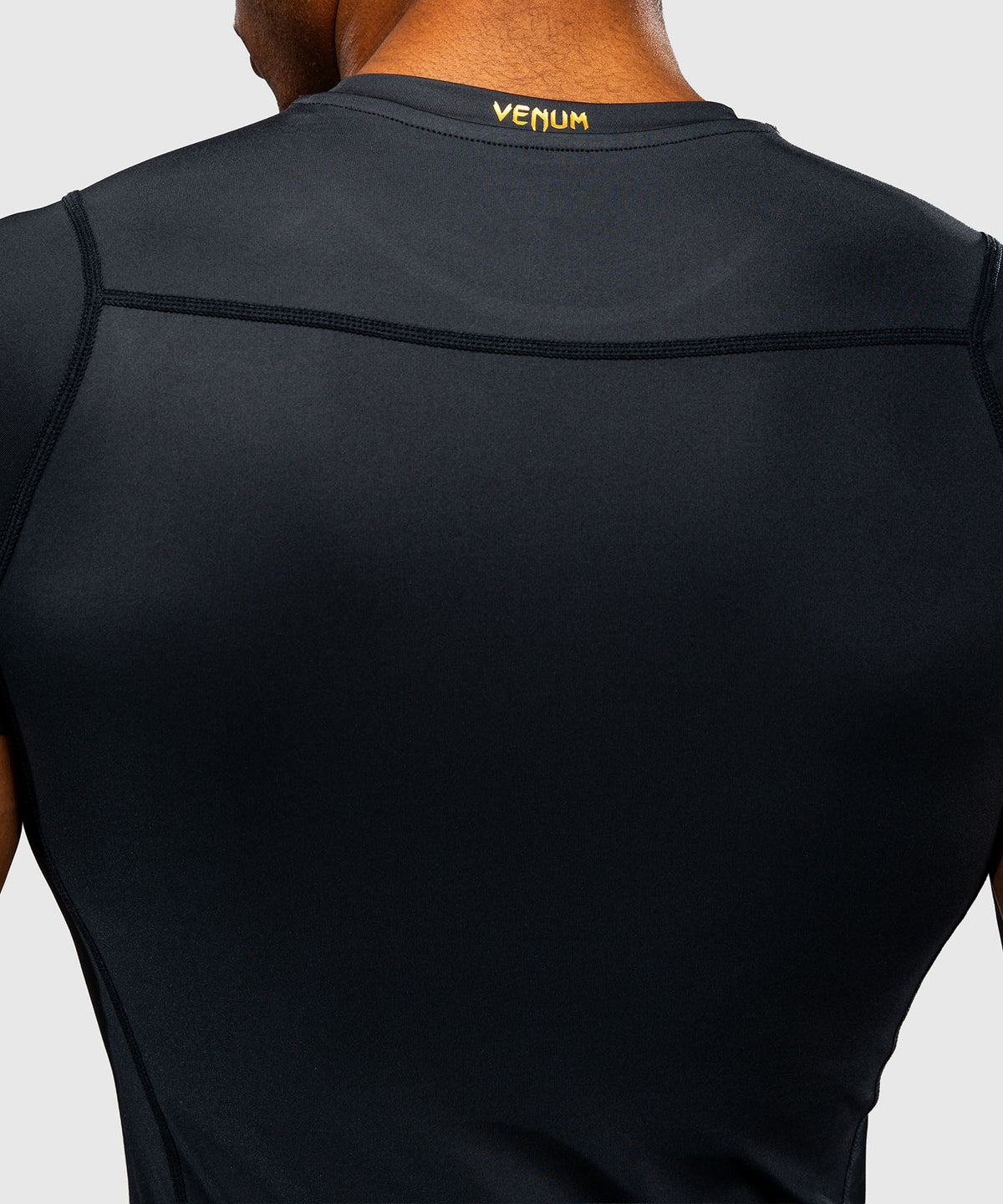 Venum Attack Rashguard de manga corta - Negro/Dorado