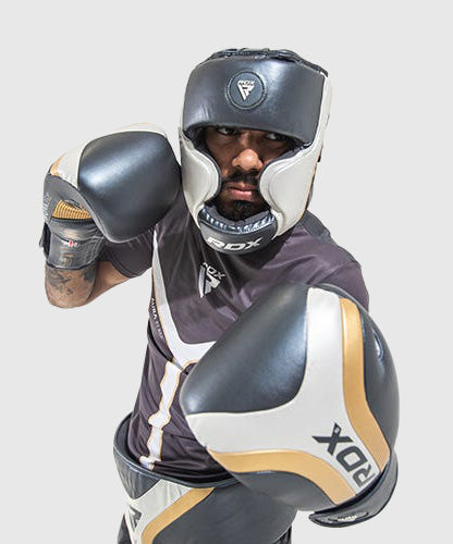 RDX Sports Aura T-17 Casco da Boxe - Nero/Bianco/Oro
