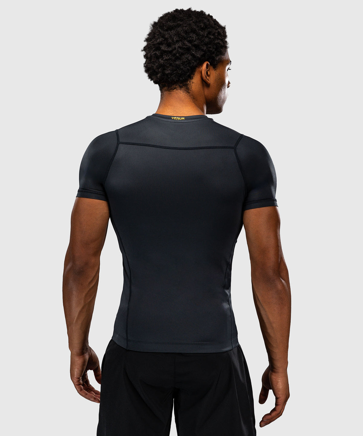 Venum Attack Rashguard de manga corta - Negro/Dorado