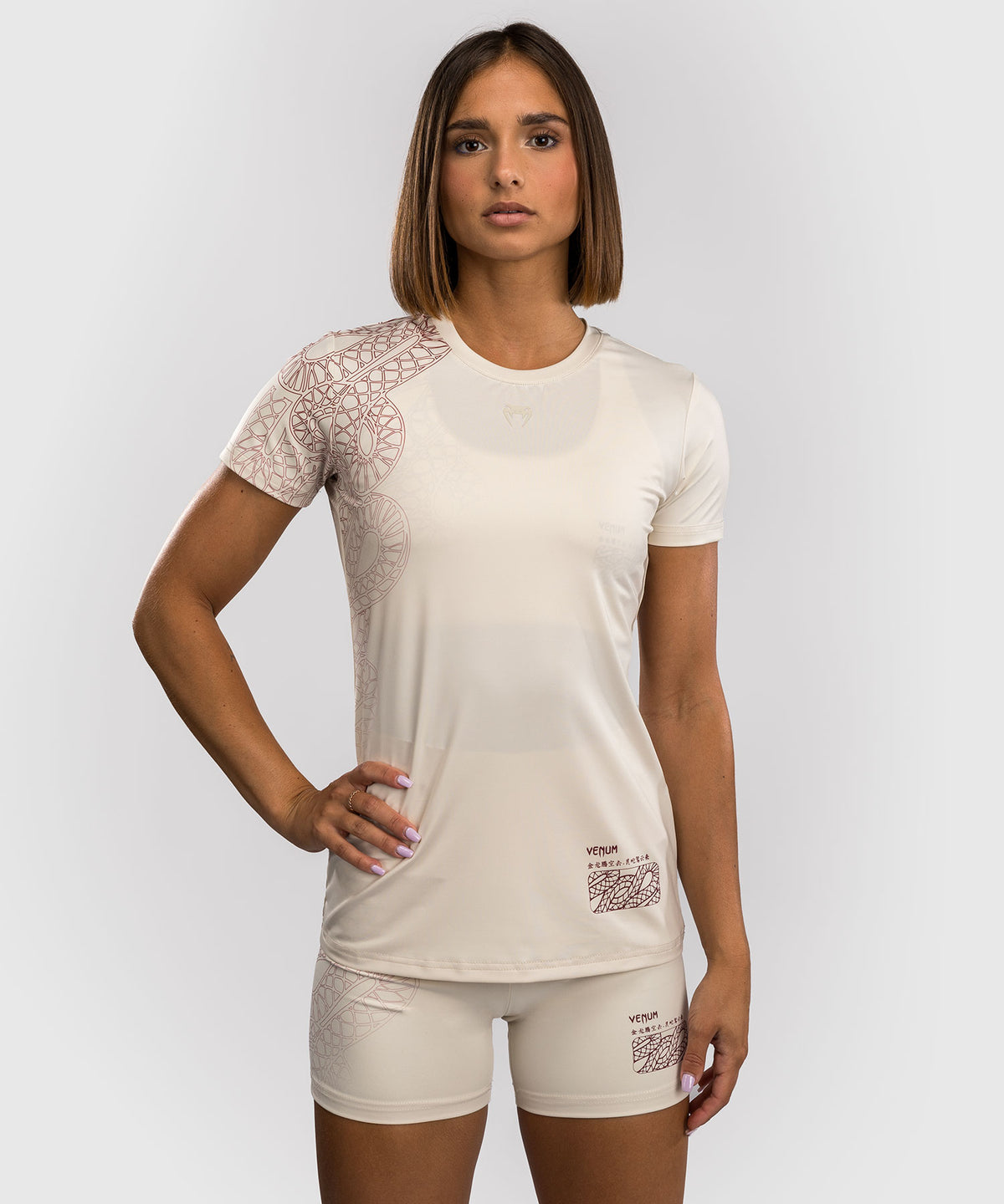 Venum Serpenti Camiseta Dry-Tech para Mujer – Marfil/Burdeos