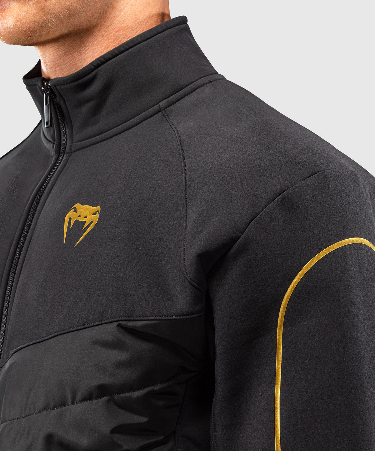 Venum Paddock Chaqueta softshell - Negro/Dorado