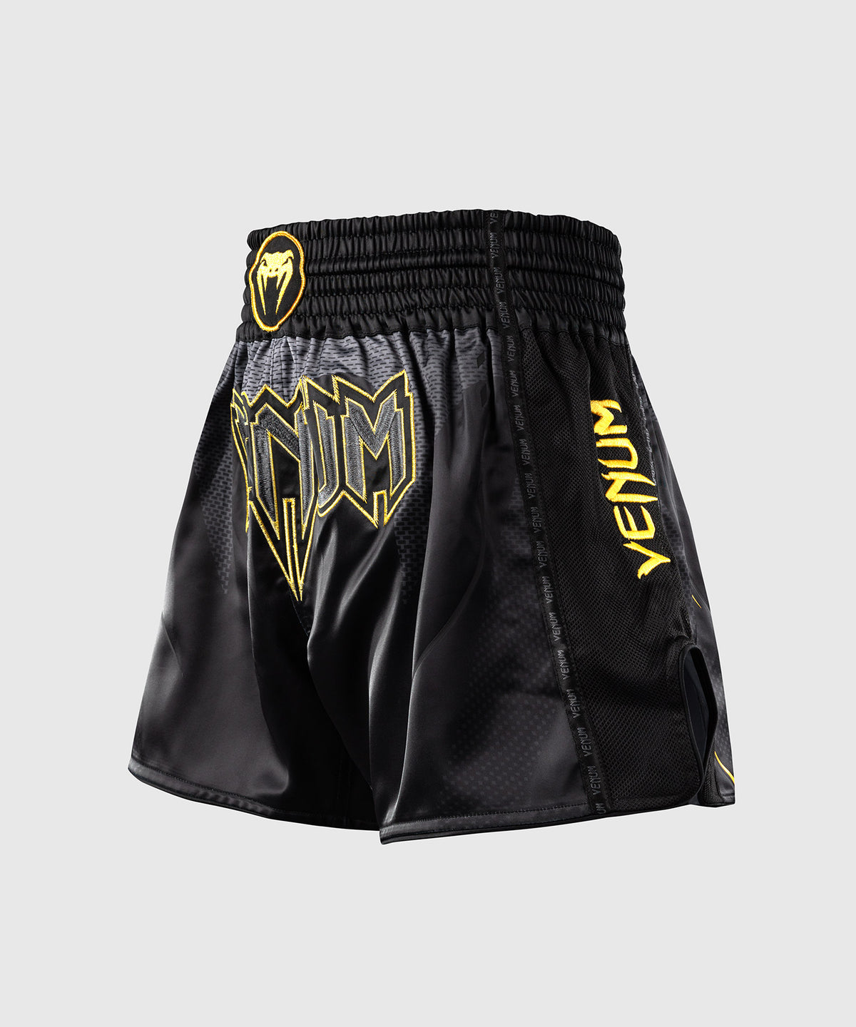 Venum G-Core Muay-Thai-Shorts - Schwarz/Gold