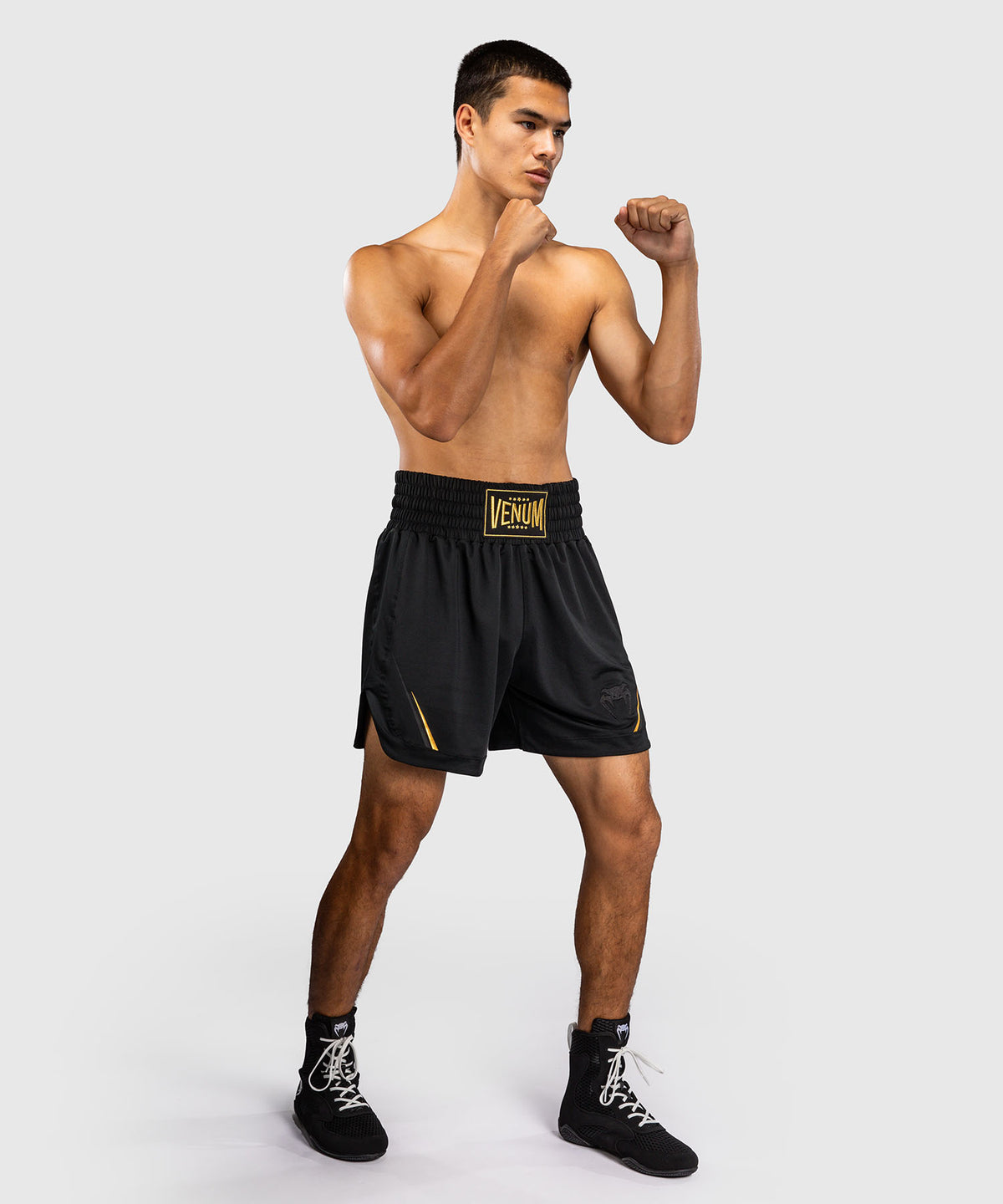 Venum G-Core Boxshorts - Schwarz/Gold