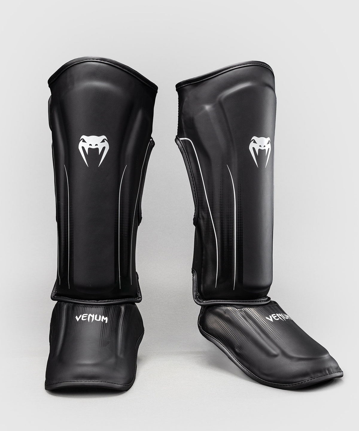 Venum Stealth Espinilleras – Negro/Blanco