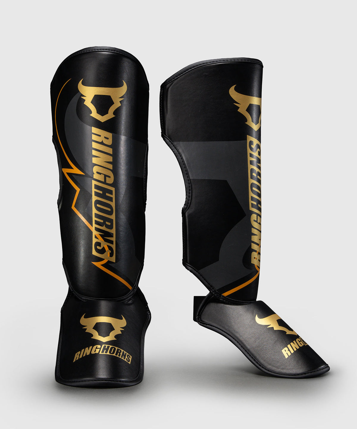Ringhorns Charger by Venum Shin Guards - Black/Gold