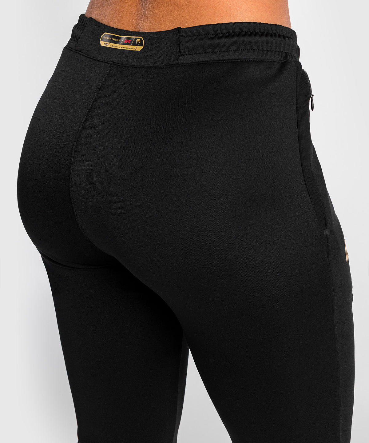 UFC Adrenaline by Venum Authentic Fight Night Walkout-Hose für Frauen Women’s Walkout Pant  - Champion