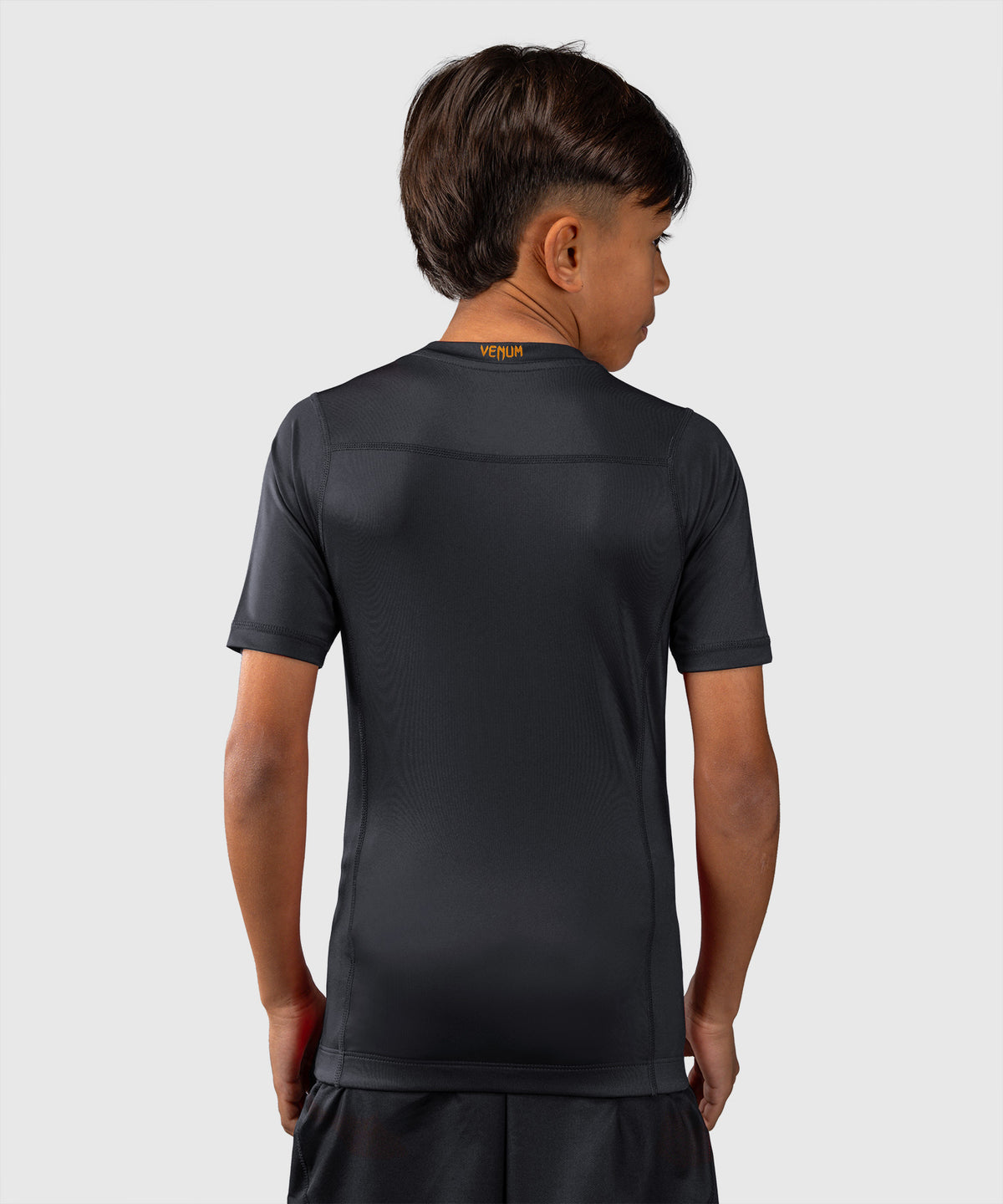 Venum Attack Rashguard de manga corta para niños - Negro/Dorado