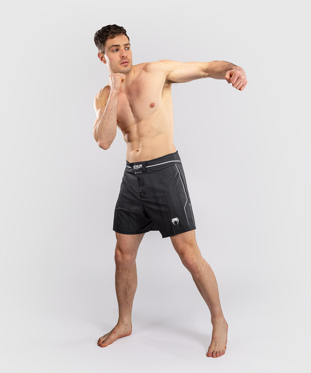 Venum Stealth Short de Combate – Negro/Blanco