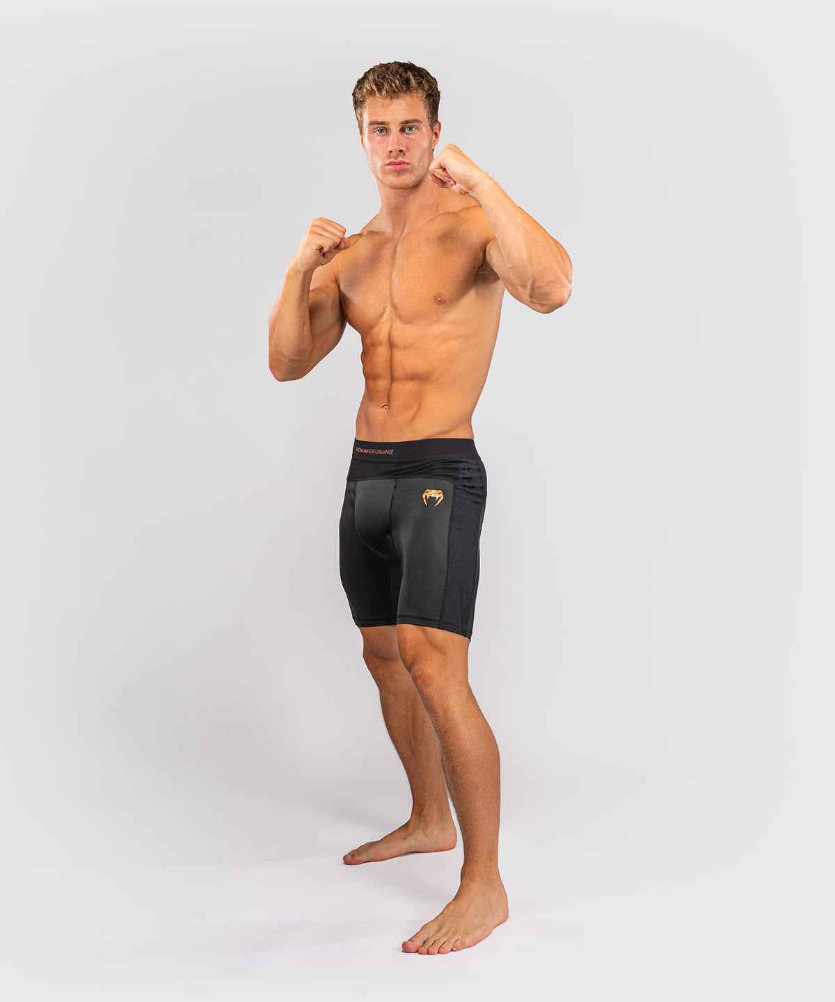 Venum G-Fit Revolution Pantalón corto de Vale Tudo - Negro/Cobre