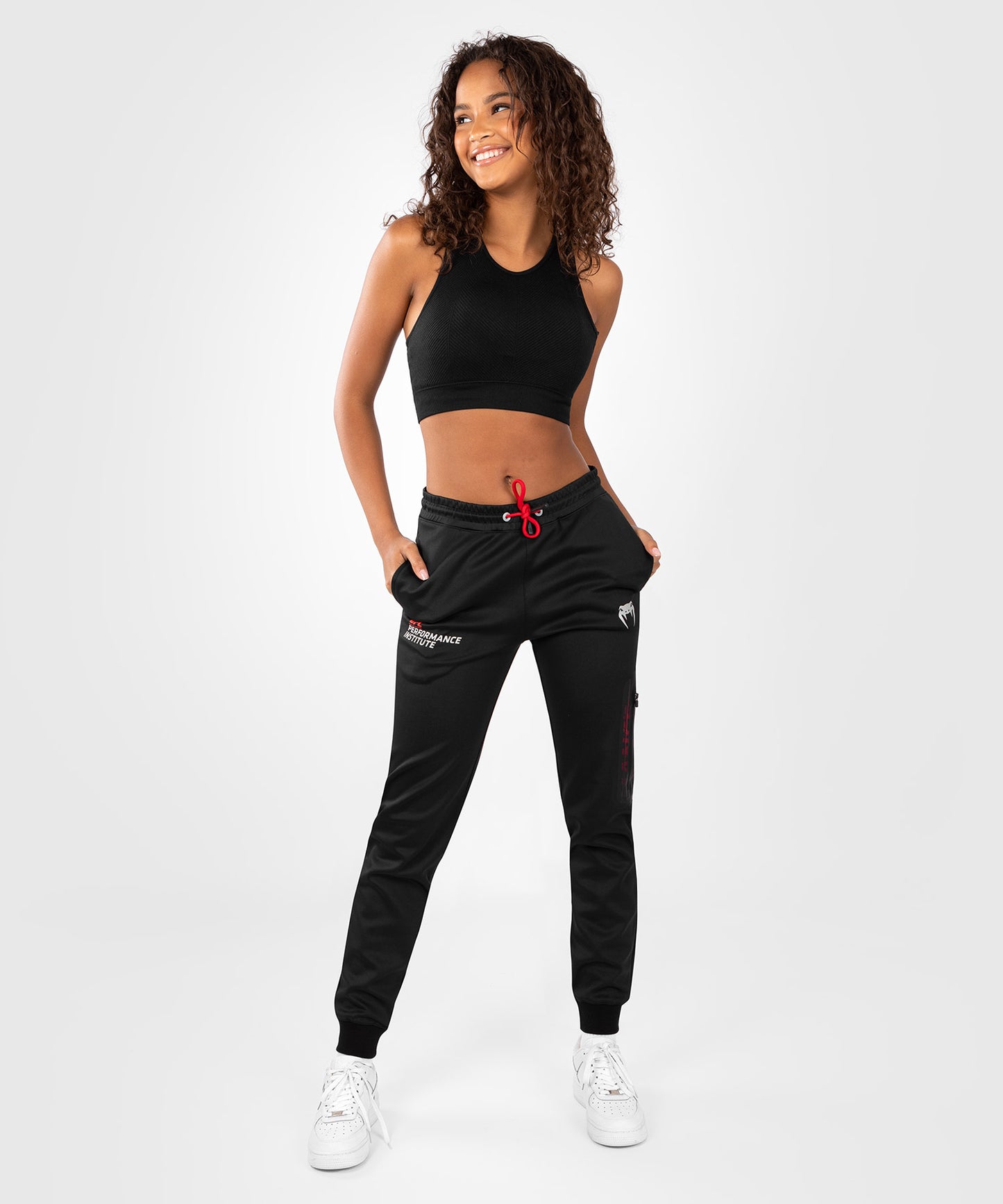 UFC Venum Performance Institute 2.0 Pantalón de Chándal para Mujer - Negro/Rojo