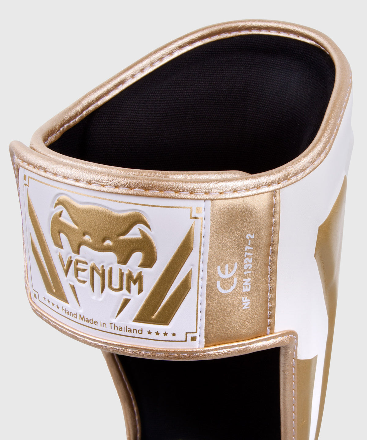 Protège-tibias Venum Elite - Blanc/Doré