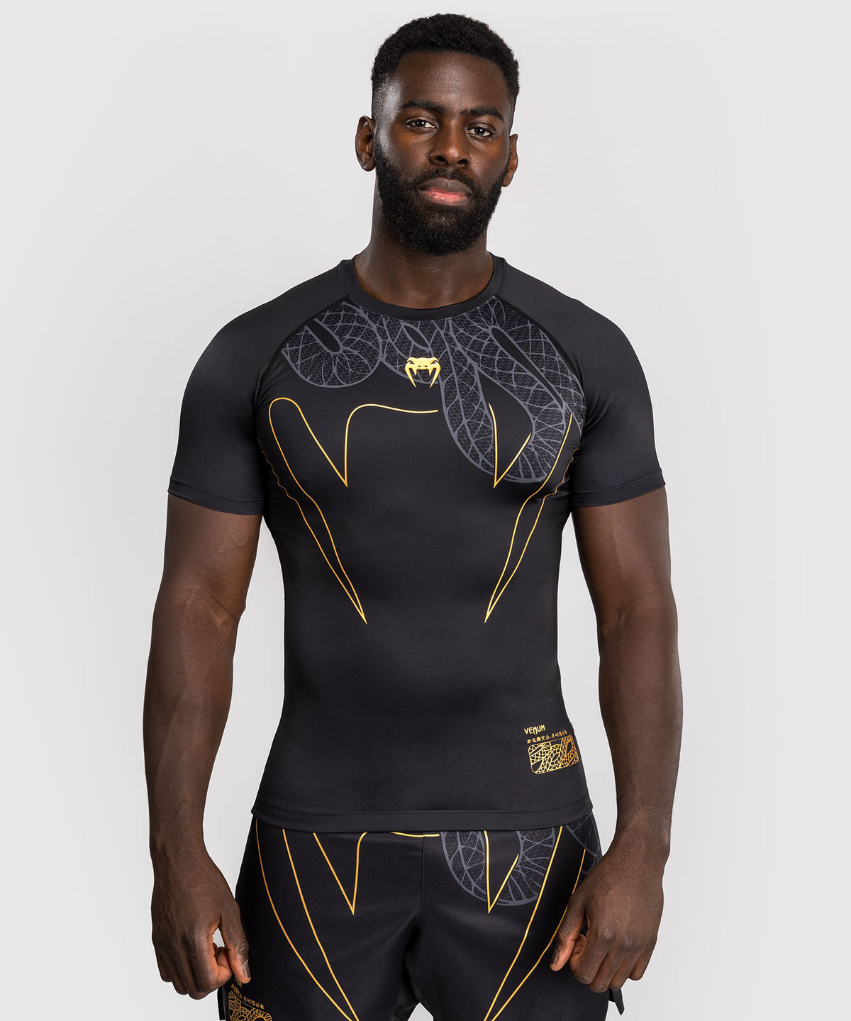 Venum Serpenti Kurzarm Rashguard – Schwarz/Silber/Gold
