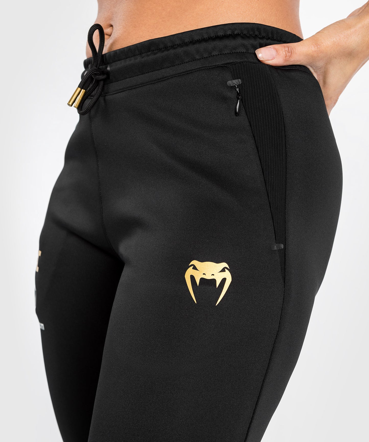 UFC Adrenaline by Venum Authentic Fight Night Walkout-Hose für Frauen Women’s Walkout Pant  - Champion