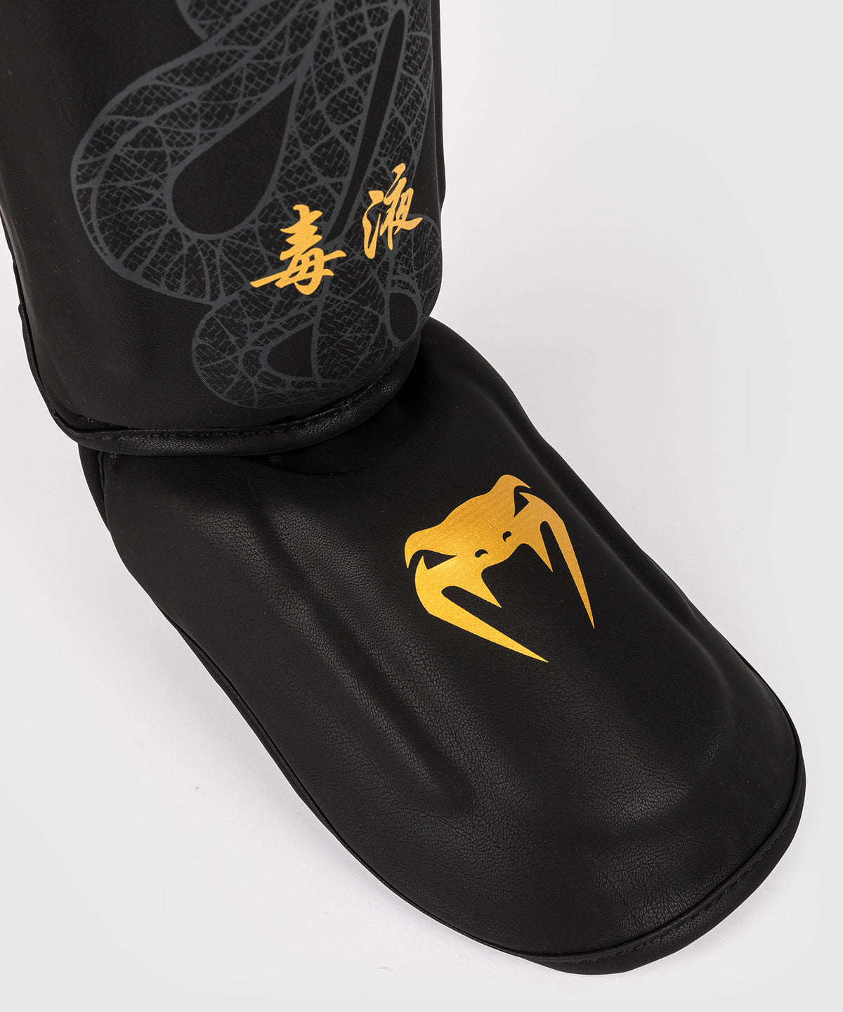 Venum Serpenti Shin Guards - Black/Silver/Gold