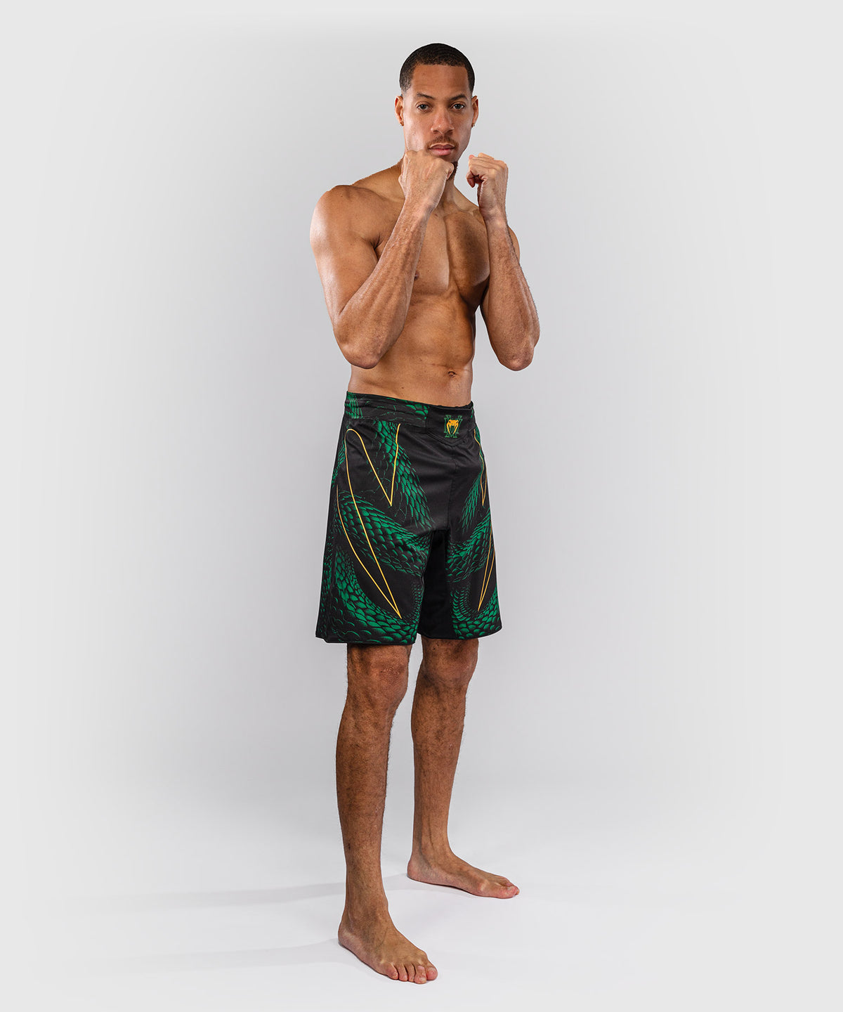 Venum Matupa Pantaloncini da Combattimento - Nero/Verde/Oro