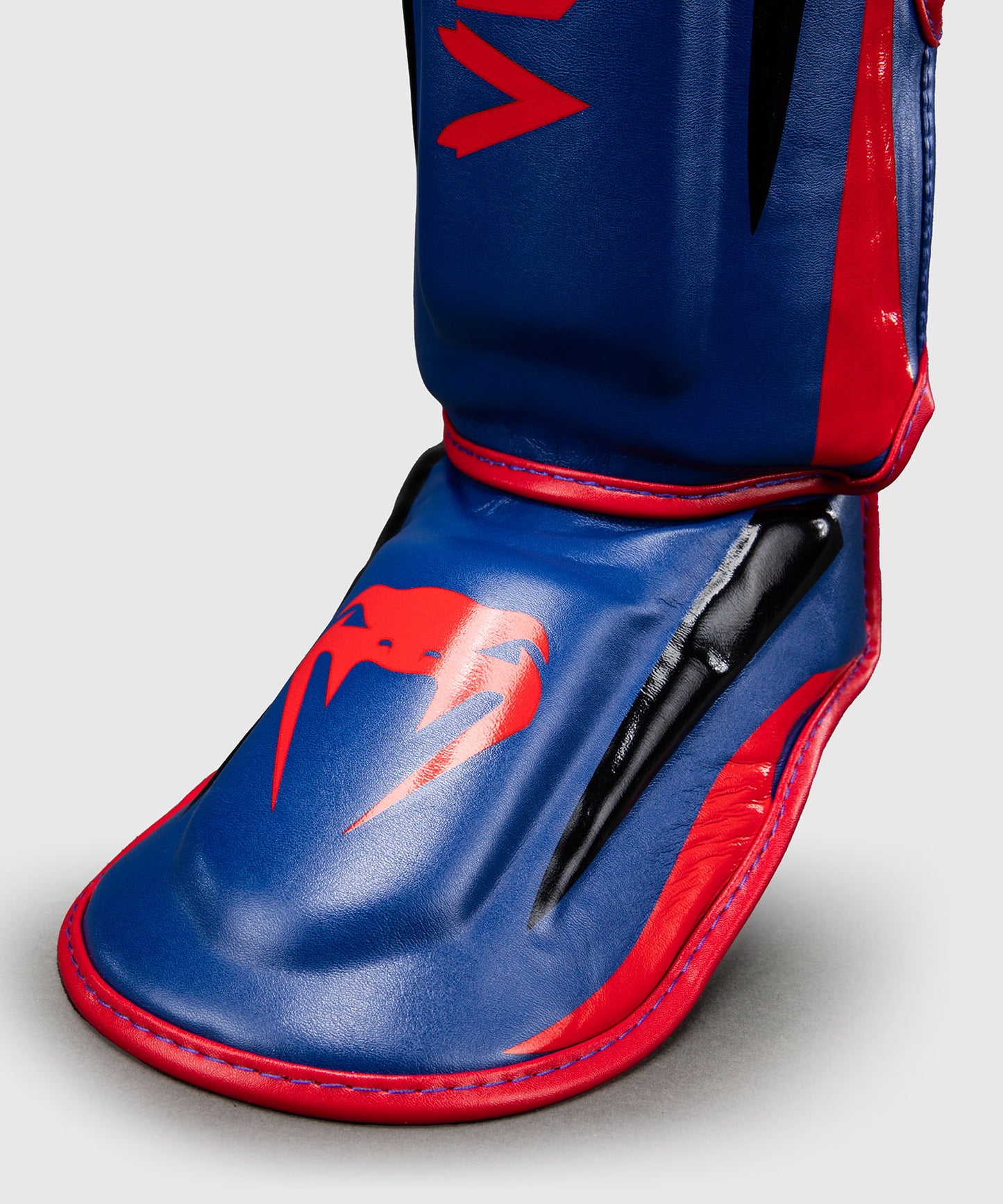 Venum Elite Protectores de Espinillas - Azul Oscuro/Rojo
