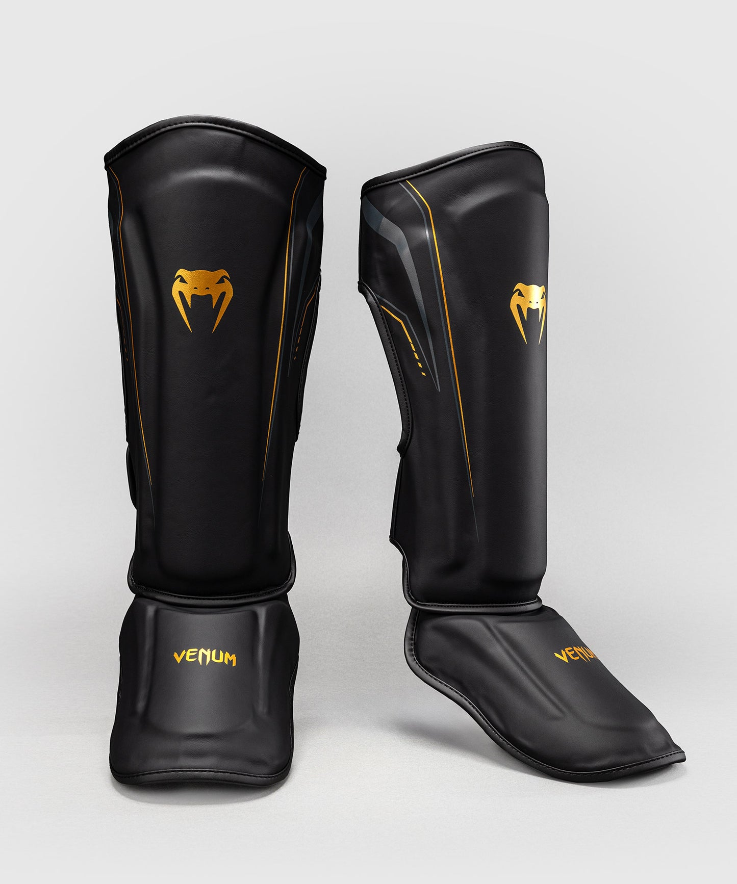 Venum Streamline Paratibie – Nero/Oro