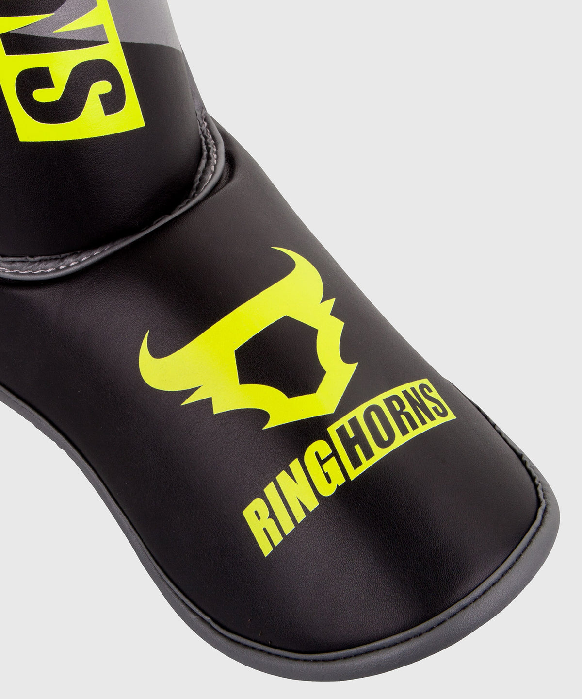 Protège-tibias et pieds Ringhorns Charger - Noir/Jaune Fluo
