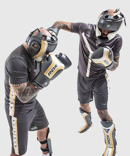 RDX Sports Aura T-17 Casco da Boxe - Nero/Bianco/Oro